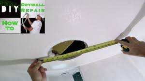 You can do it yourself with materials you probably already have in your house. How To Patch Drywall Hole On A Ceiling Diy Drywall Repair Tutorial Part 1 Installing Drywall Youtube