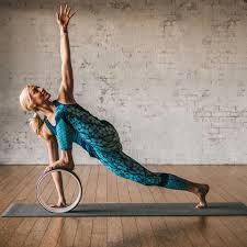 Yoga Wheelyoga Wheel Violet Spring Yogaposesideas Yoga Wheel Yoga Wheel Exercises Yoga Poses