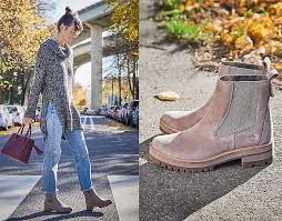 A casual boot for brisk winter mornings around town. Stylish Young Woman Wearing A Long Knit Top Flared Jeans And Timberland Courmayeur Valley Chelsea Boots Chelsea Boots Outfit Timberland Chelsea Chelsea Boots
