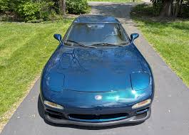 Image result for Phoenix Blue 1975 Mazda
