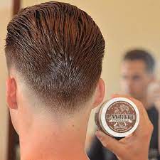 Great Back View Of An Extreme Lowandtight With A Slickback Crafted By Iranthebarbernicely Tapered A Mens Hairstyles Undercut Mens Hairstyles Haircuts For Men