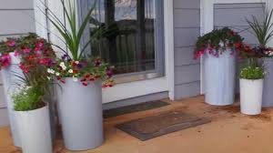 These tall planters i got last year and two of my favorites as i feel they're not only the perfect size planting flowers in a pot is not a long process, if you come prepared and have followed the steps prepare your planter and the soil. How To Turn Trash Cans Into Tall Planters