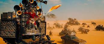 Nel film max rockatansky unisce le forze con la guerriera furiosa per sfuggire ad immortan joe, leader di un culto , e al suo esercito. Mad Max S Flame Throwing Guitarist Channeled Soundgarden Sepultura While Filming Theprp Com