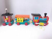 And round its head a blanket fling ? Vintage 1963 Fisher Price Huffy Puffy Train 999 Wood Pull Toy Ebay