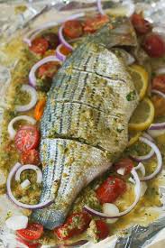 Jump To Recipe Print Recipe Whole Baked Seabass With Tomatoes Onions Garlic Herbs And Spices Simp Whole Fish Recipes Baked Whole Fish Baked Sea Bass