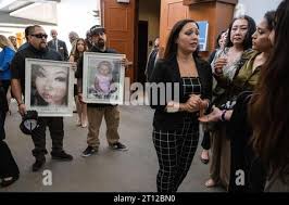 Roseville, CA, USA. 10th Oct, 2023. Jacob Chavez and Johnny Tabular hold  photographs of their niece Jewel Marie Wolf with mother of victim Regina  Leah Chavez after the sentencing of Nathaniel Evan Cabacungan, 22, for  second-degree murder for the ...