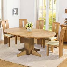 Want to keep it classic with your dining table? Monty Solid Oak Extending Round Dining Table With 6 Arley Chairs Robson Furniture