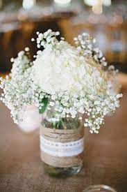Burlap Lace Centerpiece Effortless White Flowers Like Hydrangea And Baby S Breath Can B Wedding Centerpieces Mason Jars Mason Jar Wedding Burlap Lace Wedding