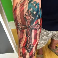 This is a pretty cool looking american flag tattoo with crosses. 51 Best American Tattoos Design And Ideas
