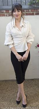 Everything you need to know about anastasia steele's outfits in fifty shades of grey. Dakota Johnson Attends Fifty Shades Freed Photocall Daily Mail Online