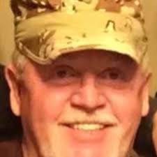 What could be causing my Ford 8N tractor to rough idle and backfire?