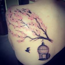 Black And White Cherry Blossom Shoulder Tattoo Cherry Blossom And Bird Cage Tattoo Birdcage Tattoo Tattoos Blossom Tattoo
