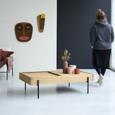 Made of solid teak wood in the 1970's with retro brass edging. Teak Coffee Table 120x70 Cm Living Room Furniture Tikamoon