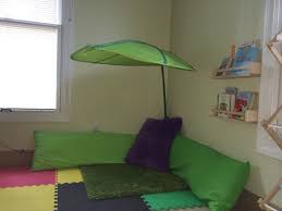 Our Reading Corner With Ikea Pillows Rug Leaf Canopy And Spice Racks As Book Shelves Ikea Pillows Home Decor Room