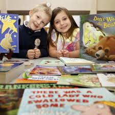 Prescott students chip in to help library