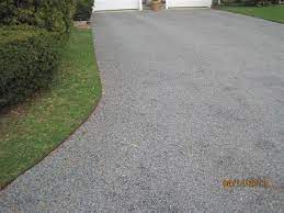 Asphalt driveway with gravel edging. Metal Edging For Chat Driveway George Skipper Son Inc Services Asphalt Driveway Edging Asphalt Driveway Gravel Driveway Edging