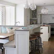 Banquette seating makes perfect use of this transitional kitchen alcove as a modern pendant light hangs over a simple tulip table. Kitchen Design Decor Photos Pictures Ideas Inspiration Paint Colors And Remodel Page 2 Kitchen Design Kitchen Remodel Kitchen Island Design