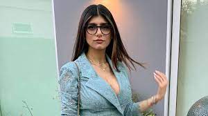 Download Mia Khalifa Wearing A Suit Wallpaper | Wallpapers.com