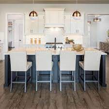 In a kitchen with a small island and oversize pendant lights, two pendants would provide enough illumination and three would overwhelm the space. 2020 Lighting Trends The Latest Looks Styles In Light Fixtures Hayneedle Recessed Light Conversion Kit Dining Room Lighting Recessed Lighting