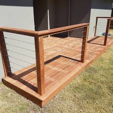 Tip.1 merbau timber decking is quite a dark hardwood timber, so if your deck is new and receiving its first treatment we recommend starting your. Merbau Decking With A Merbau Handrail And Stainless Steal Wiring Diy Deck Timber Deck Deck Handrail