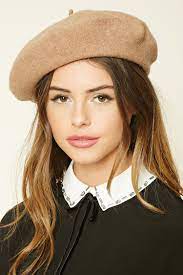A Wool Beret Featuring A Pointy Accent On Top Beret Fashion Hat Fashion Fashion