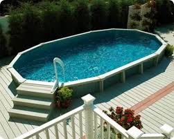 In fact, if you're building a concrete pool, you can have it shaped however you like. 15 Awesome Above Ground Pool Deck Designs Intheswim Pool Blog