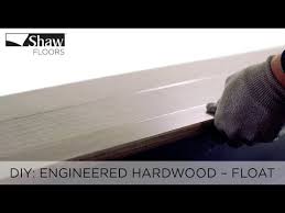 Each layer is positioned in a different direction. How To Install Engineered Hardwood Floating Method Youtube