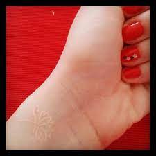 Lotus Flower White Ink Tattoo Google Search Red Nails White Tattoo Lotus Flower Tattoo Wrist