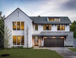 Evolution Of Design Dca S Transitional Home Designs Design Dca Stucco Homes Modern Farmhouse Exterior House Exterior