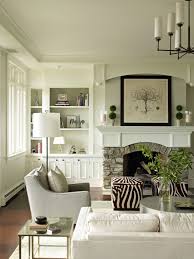 It S All Good Fresh Take On The Fireplace Millwork W Stone Who Can Go Wrong W Zebra The Light Fixture Is A Nice Touch Home Home Living Room House Interior