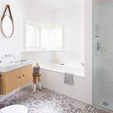 Bright White Bathroom With Patchwork Floor Tiles Ideal Home Patchwork Tiles Bathroom White Bathroom Small Bathroom Remodel