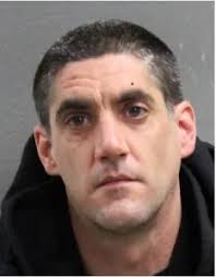 Joseph Larue is described as a white male adult with dark hair, brown eyes,  face and neck tattoos, approximately 6' tall and weighing approximately 185  lbs. He is believed to be armed