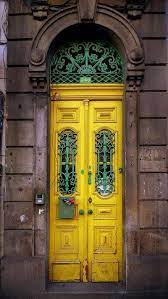 Very Unique Front Doors Wonder If They Are Original To The Home Or If The Home Owner Found Them These Certainly Are Unique Doors Cool Doors Yellow Doors