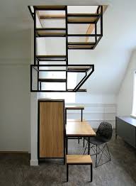 Suspended Staircase Combined With Desk And Storage Space By Mieke Meijer Staircase Storage Living Room Warm Home