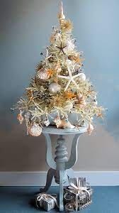 Check spelling or type a new query. The Most Marvellous Mini Beach Christmas Trees By Tree Decorator Darryl Moland Beach Bliss Living Beach Christmas Decorations Beachy Christmas Florida Christmas