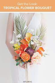 My cotyledon undulata bloomed and the flowers are so beautiful. Get The Look Tropical Flower Bouquet Coral Wedding Flowers Wedding Bouquets Bride Wedding Bridal Bouquets