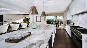 White kitchen countertops provide a clean cut edge. Living With Marble Countertops Here S The Stone Cold Truth Realtor Com
