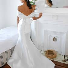 With deep jewel colors and autumnal prints, these fall wedding guest dresses will have you ready for any upcoming fall wedding! Nouvelle Amsale Wedding Dresses By Season