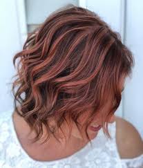 Brown rose hair color with the waves looks adorable, and we don't see this hair color dying anytime soon although it has been in the trend for a while now. Stunning Brown Hair With Highlights Trending This Year