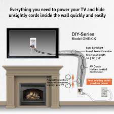 Learn how to hide tv wires without cutting the wall, how to hide wires in your office and how to create an electrical charging station. Hiding Wires On Wall Mounted Tv Above Fireplace Extension Kit Powerbridge