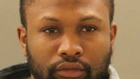 Police arrest 2 men with large amount of heroin, guns