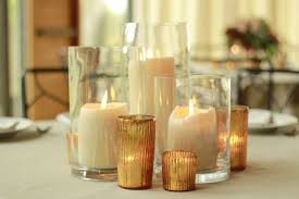 Some Of The Tables Will Feature Varying Heights Of Pillar Candles In Clear Vases With Gold M Candle Centerpieces Gold Candle Centerpieces Mercury Glass Votives