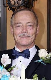 Obituary of John E. Corbett