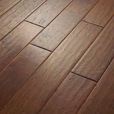 It's usually 8 mm thick, so it's similar to an engineered hardwood (or laminate flooring). Engineered Hardwood Vs Laminate Vs Vinyl Flooring