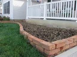I Like The Idea Of Having A Brick Border Along The Fences It Can Be Straight Or Wavy Like This Photo Mode Brick Garden Edging Brick Garden Brick Flower Bed