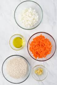 Ingredients · 5 carrots, grated · 1 red onion, sliced · 1 teaspoon cumin seeds · 1 tablespoons garlic puree · 1 cup rice · 2 cups of boiling water · salt and pepper . Carrot Rice Brazilian Kitchen Abroad