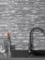 A mosaic glass tile backsplash can be difficult to install and is best left for experts because the tiles are delicate and can break while being installed. Glass Backsplash Tile Clean Look Modern Traditional Backsplash Com