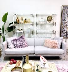 Side tables, nightstands and cocktail tables are neatly nestled into these cubbies on one wall. The Art Of Entertaining Harlow Thistle