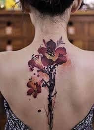 40 quote and flower spine tattoo. Spine Tattoo Pain Placement Ideas Designs