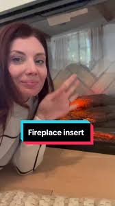 I found the perfect electric insert for my faux fireplace. You can find all  the design details and the insert info in my profile #diy #diyprojects  #diyhome #fireplacemakeover #livingroom